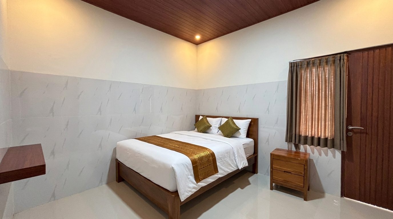 Foto Kamar Studio Deluxe Yka Residence — ilustrasi staging dari foto asli (sprei & bantal ditambahkan)